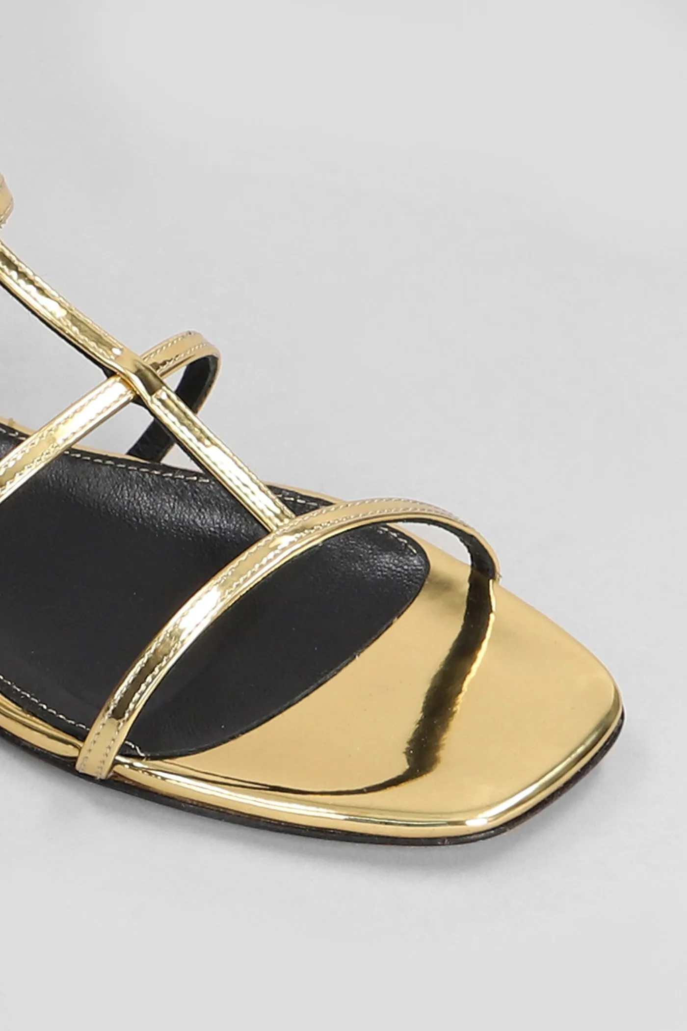 Flats in gold leather